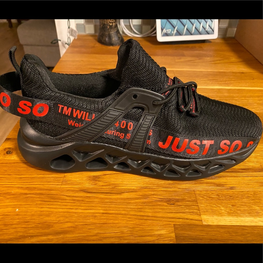 NEVER WORN All Might Walking Shoes in black and red
